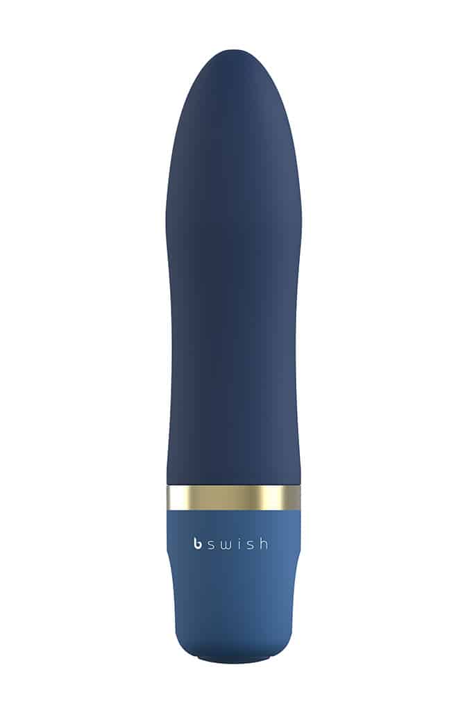 Na białym tle granatowy masażer Bcute Classic z błyszczącą obręczą w złotym kolorze i nazwą marki B swish na uchwycie.