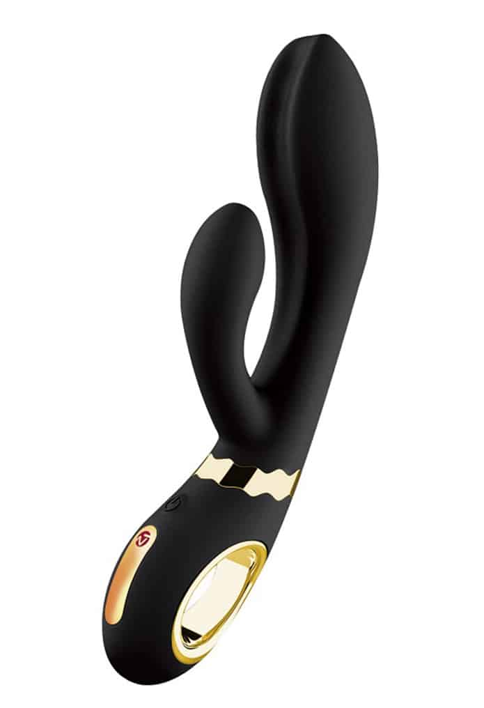 Wibrator króliczek Nomi Tang Wild ma czarny kolor, uchwyt-obręcz złotą w środku, złoty element nad rączką i panel sterowania.