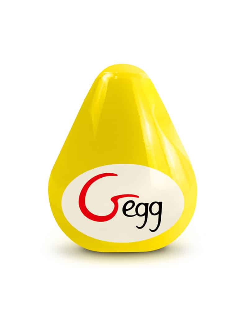Masturbator Gvibe Gegg o kształcie zbliżonym do jajka, z gładką etykietą w żółtym kolorze.